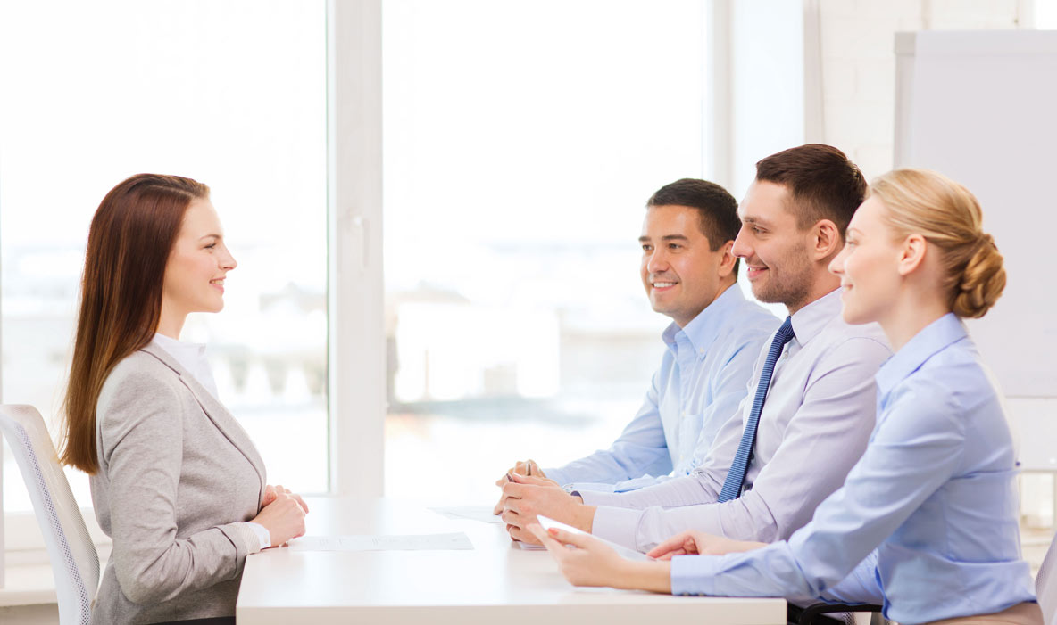 business, career and office concept - smiling businesswoman at job interview in office